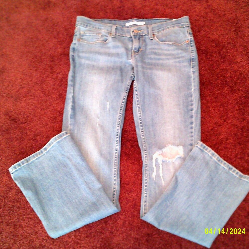 Levi's 524 Bootcut. Distressed. Size 27. Length 30"  Waist 15"